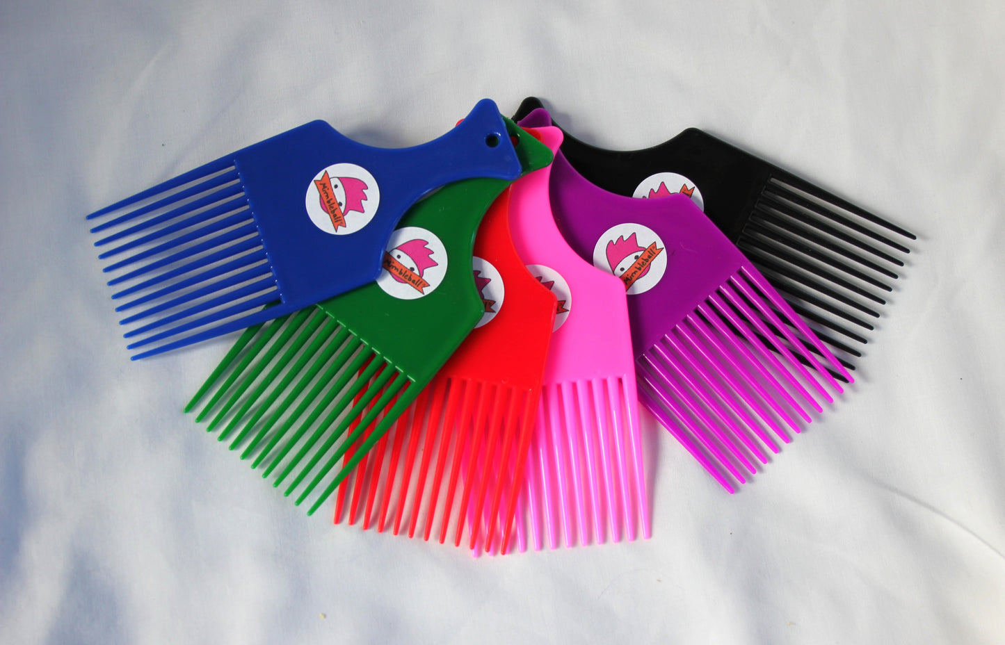 Tangle "Coiffure" Comb: Help Mimbleball hair move and "bop" much more easily and generate even more joy and giggles.